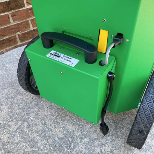 Playmate Pickleball AC Adapter AC adapter mounted on the pickleball machine